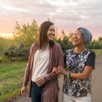 Women-Walking-Together-Outside
